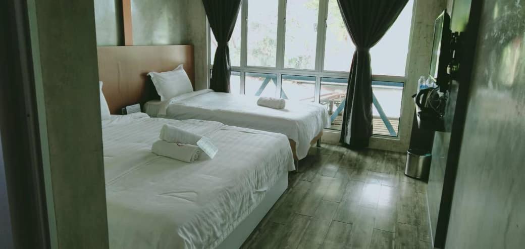Rick Resort Телук-Интан Экстерьер фото